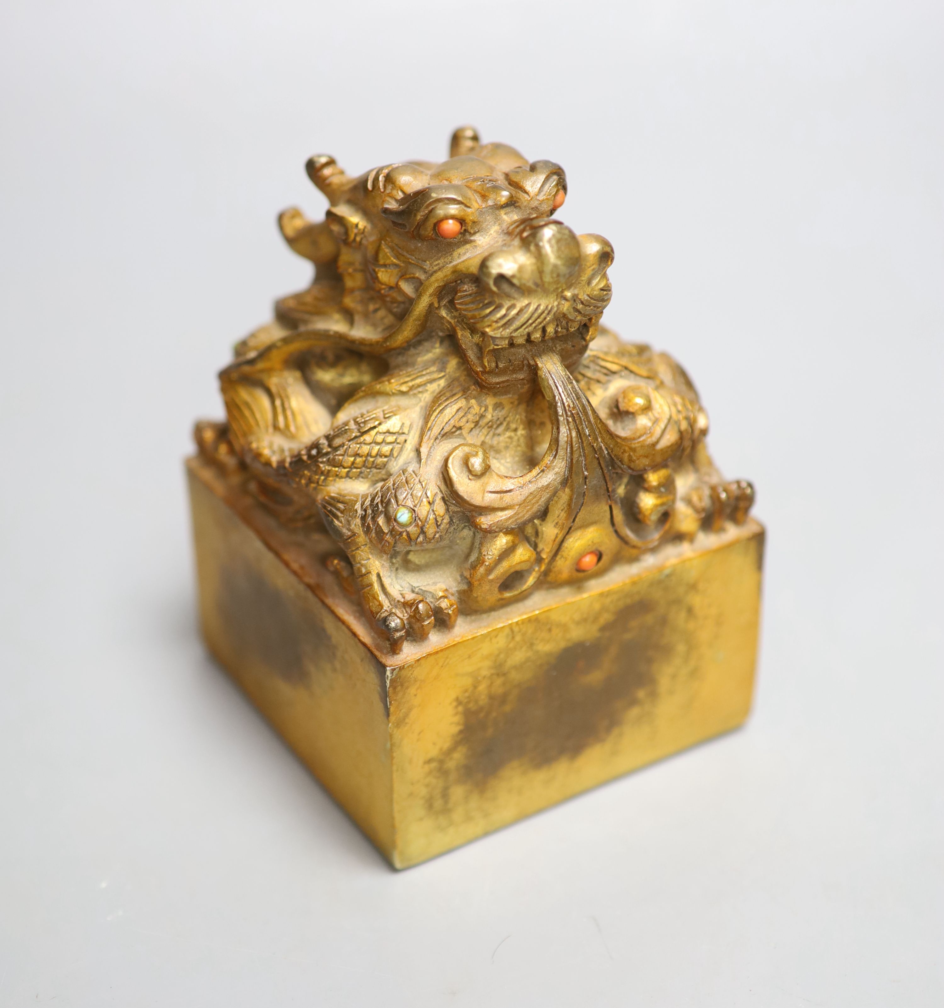 A Chinese gilt bronze dragon seal, height 13cm